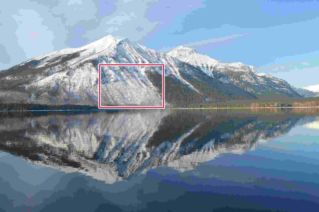 The smaller JPG at the same display size, with the matching detail region marked.