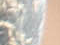 Original horn detail: gray horn, pale rim and soft tan coat.