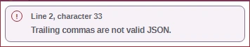 The inline error reports Trailing commas are not valid JSON, with a line and character location.
